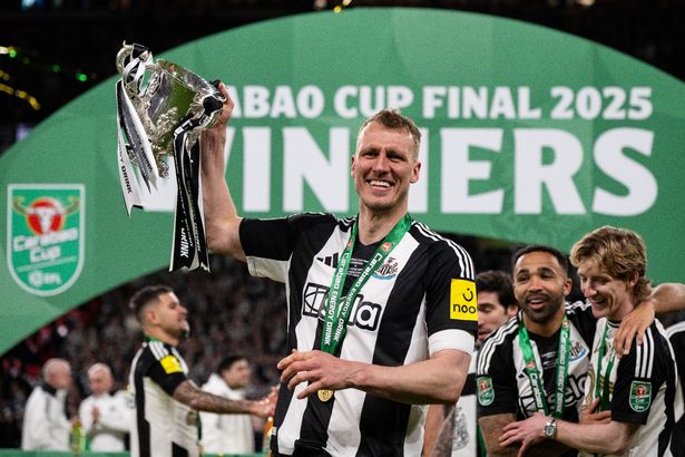 Dan Burn lifted the Carabao Cup trophy with Newcastle