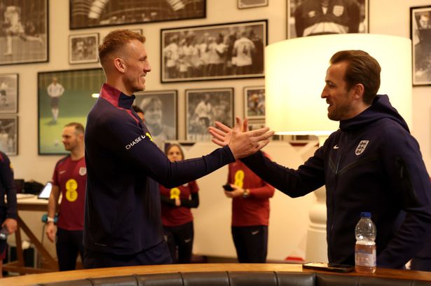 Harry Kane greets Burn