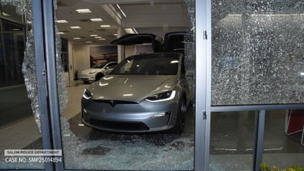 A damaged Tesla dealership