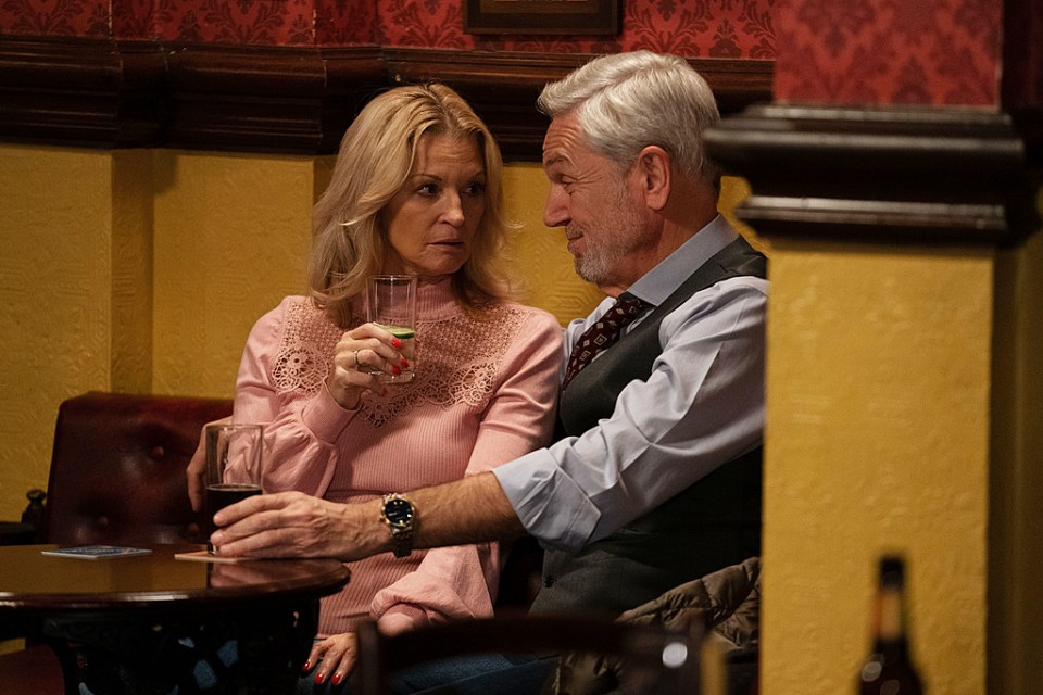 Kathy Beale and Rocky in a pub, talking.