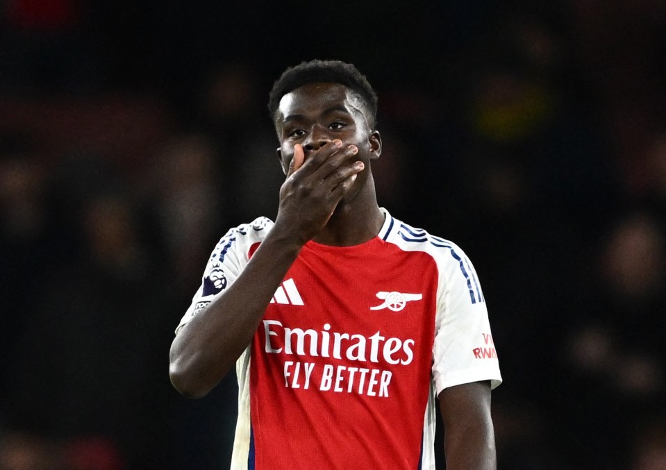 Arsenal's Bukayo Saka looking dejected.