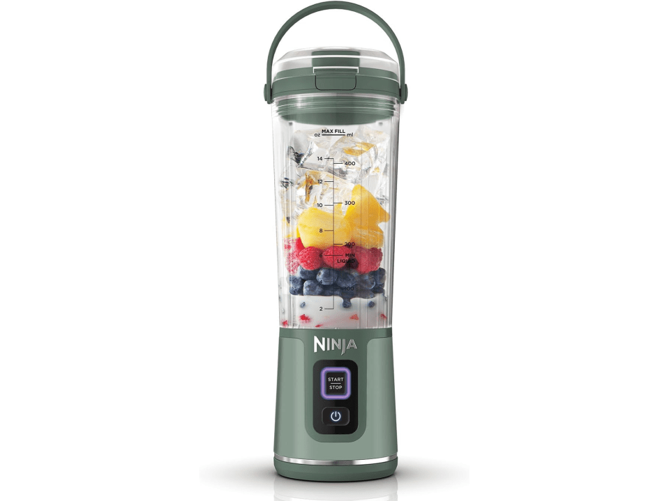 Ninja personal blender with fruit and ice.