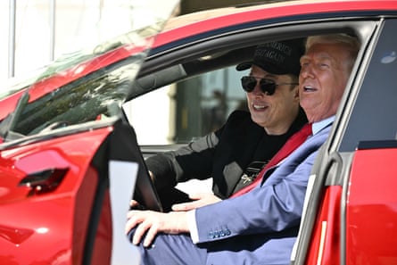 Trump and Musk speak to the press from inside a Tesla