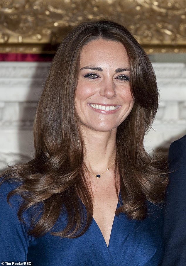 2010: Kate showcased her signature look during her and William's engagement announcement at St James's Palace in November