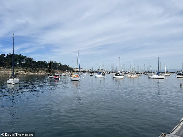 The serenity of Monterey's natural harbor attracts tourists from around the world