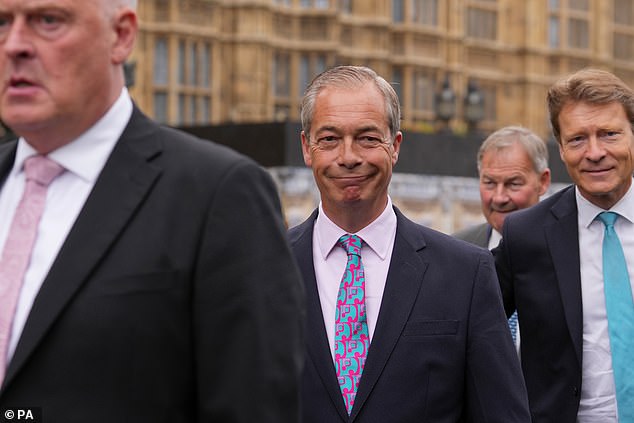 Party leader Nigel Farage with his three of his five MPs, Lee Anderson, Richard Tice and Rupert Lowe, outside Parliament in July 2024