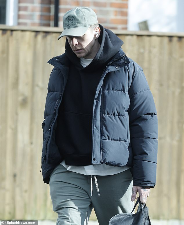 After the reports Danny understandable looked glum as he was seen out and about this week - cutting a low-key figure in a cap