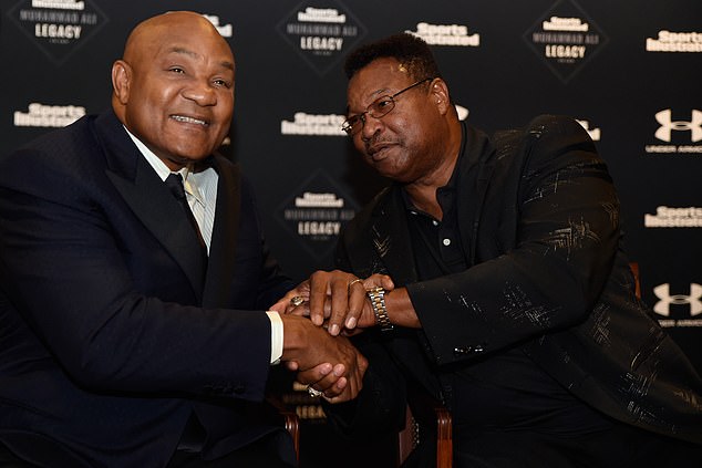 Foreman (pictured with fellow ex-champion Larry Holmes) passed away at the age of 76 on Friday, but leaves countless memories and an immense legacy in his wake