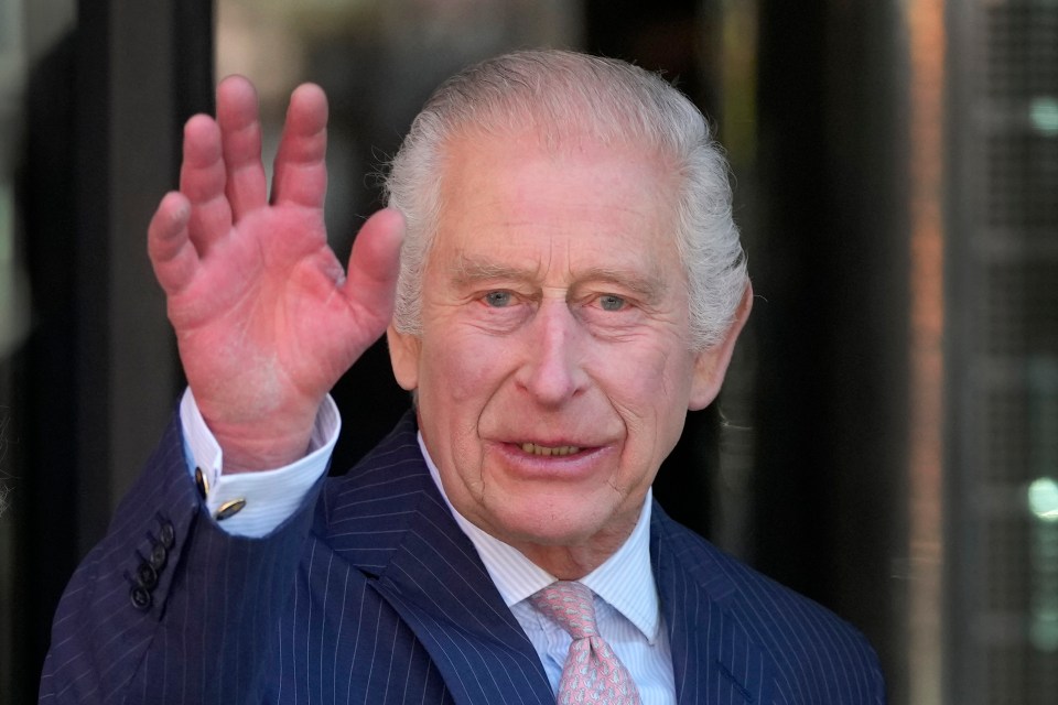 King Charles III waving.