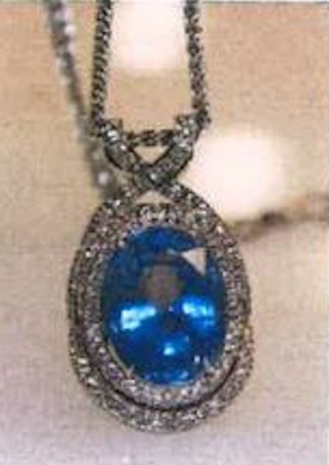 Stolen blue gemstone pendant.