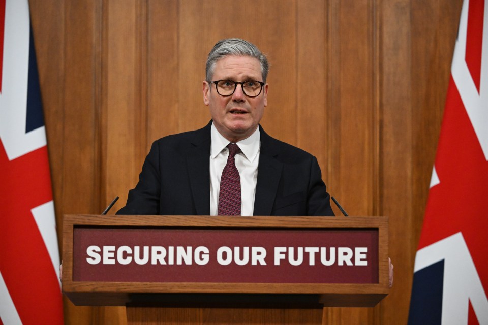 Prime Minister Keir Starmer speaking at a podium.