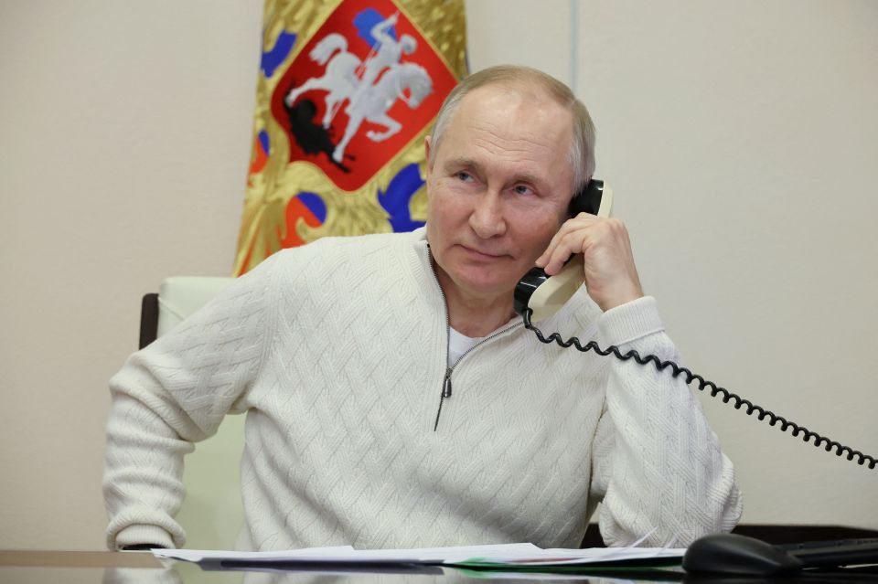 Vladimir Putin on the phone.