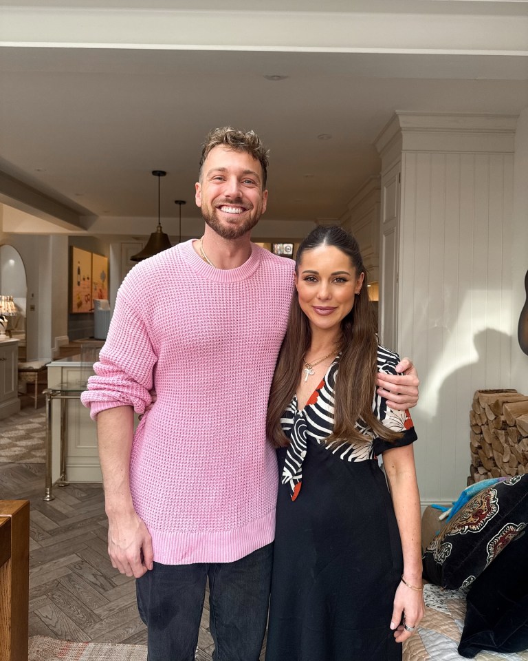 Sam Thompson and Louise Thompson posing for a photo together.