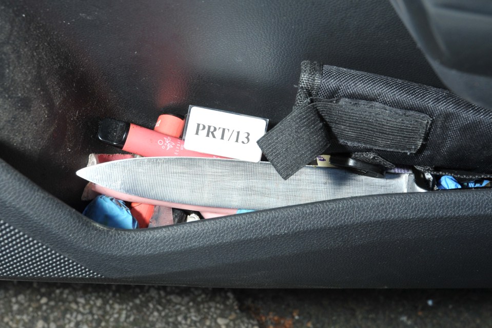 Knife and other items found in a car's door pocket.