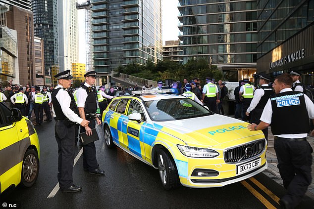 Dozens of police officers were deployed to the Britannia International Hotel in Canary Wharf