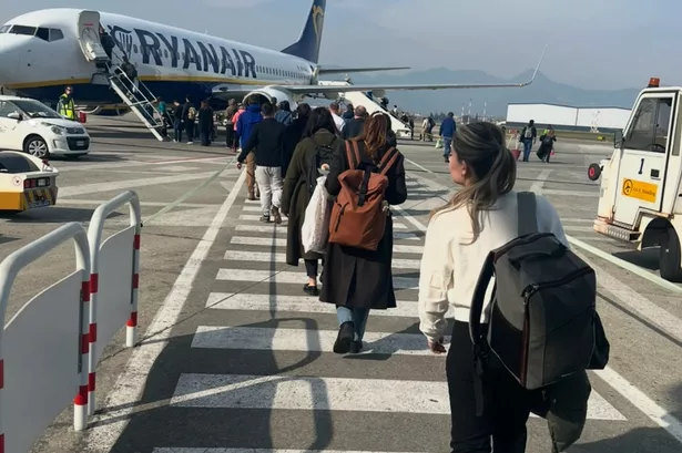 Harriet using bag boarding ryanair plane