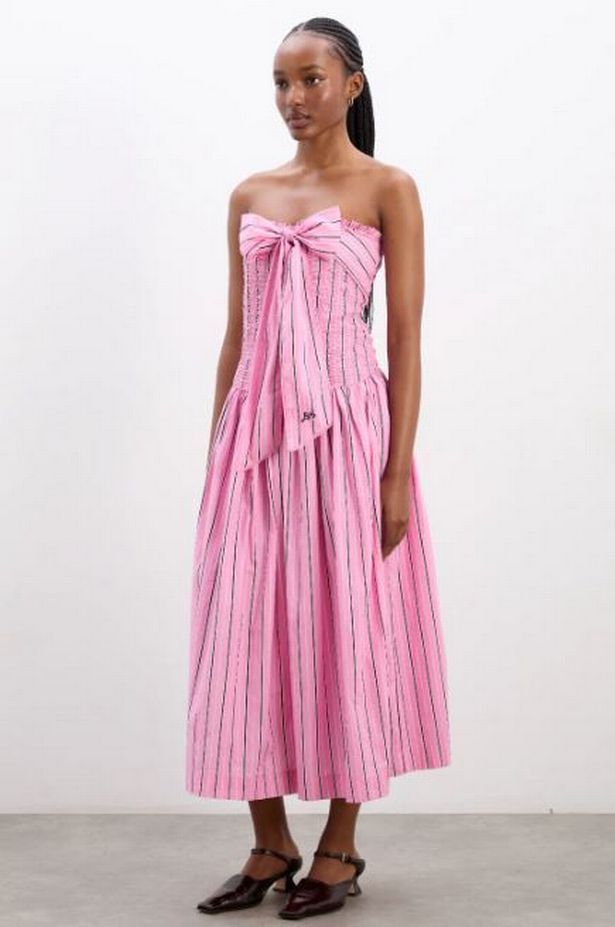 Damson Madder’s Mia Midi Dress in pink business stripe is reduced in the brand's summer sale