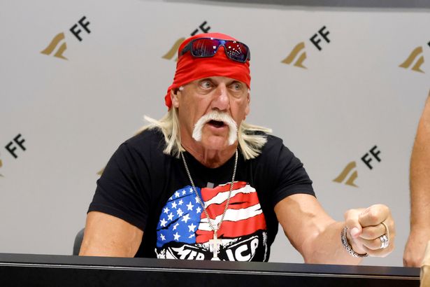 Hulk Hogan in a black top.