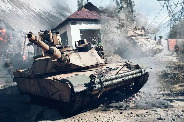 A tank tears through a village in Battlefield 6.