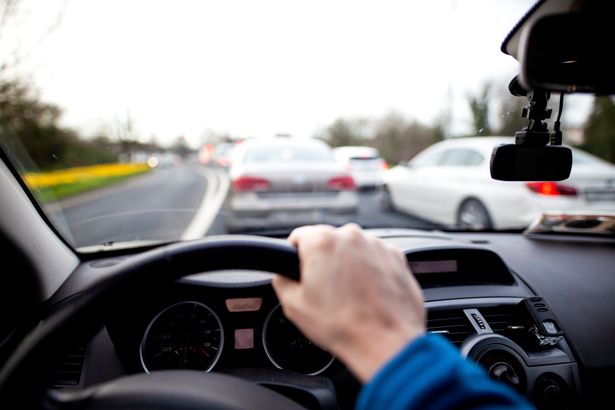 Man driving car