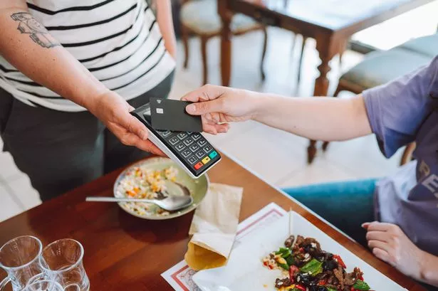 Paying for food and drinks at cafe made easy with credit cards