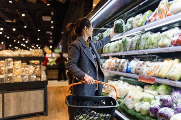 Woman shopping in supermarket