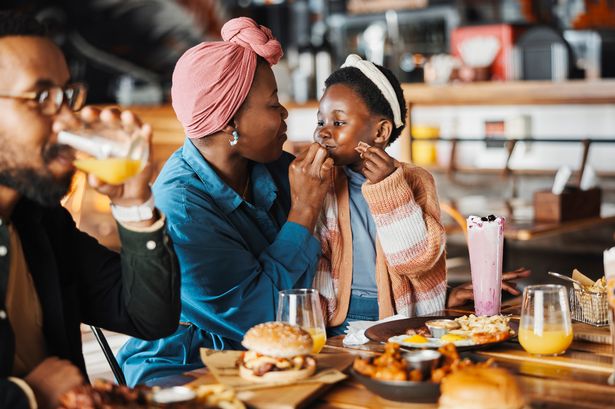 Family eating in restaurant