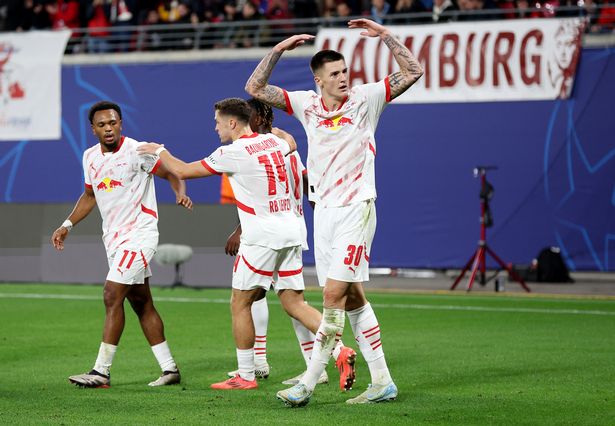 Benjamin Sesko of RB Leipzig celebrates scoring his team's first goal during the UEFA Champions League 2024/25 League Phase MD2 match between RB Leipzig and Juventus at Leipzig Stadium on October 02, 2024 in Leipzig, Germany.