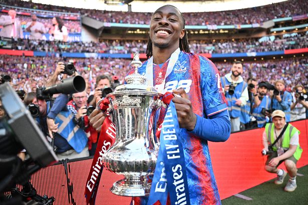 Eberechi Eze poses with the FA Cup trophy