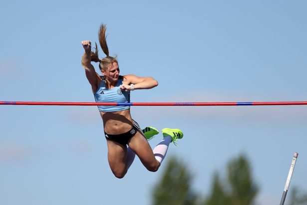 Molly Caudery celebrates her win at the national championships.