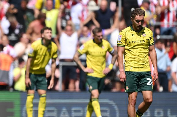 Lewis Brunt of Wrexham and teammates look dejected following defeat during the Sky Bet Championship match between Southampton and Wrexham