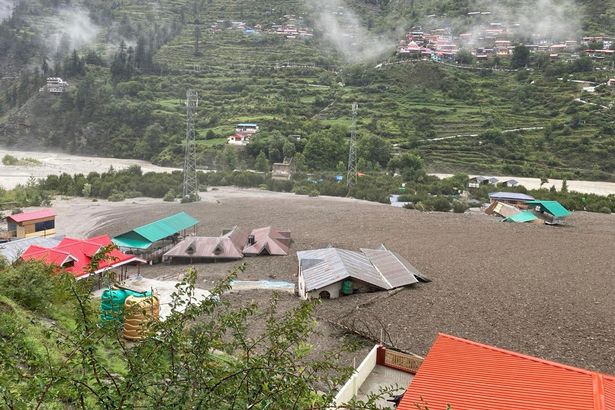 Houses are inundated in slash and some swept away after flash floods in Dharali, a Himalayan mountain village in the Uttarkashi district of Indian state of Uttarakhand, Tuesday, Aug. 5, 2025.