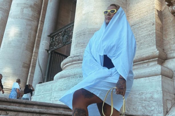 Sabrina Almeida sporting the sheet she says she was told to wear to 'cover up' while visiting the Vatican