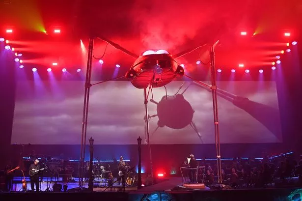 REDDITCH, ENGLAND - MARCH 21: A Martian fighting machine appears on stage during the dress rehearsal of Jeff Wayne's