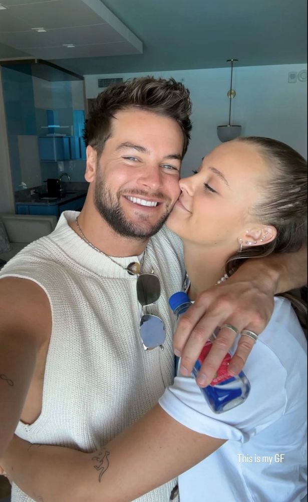 Chris Hughes and JoJo Siwa cuddled up together in a selfie.