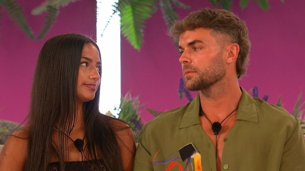 Shakira Khan and Harry Cooksley sat together in the Love Island villa.