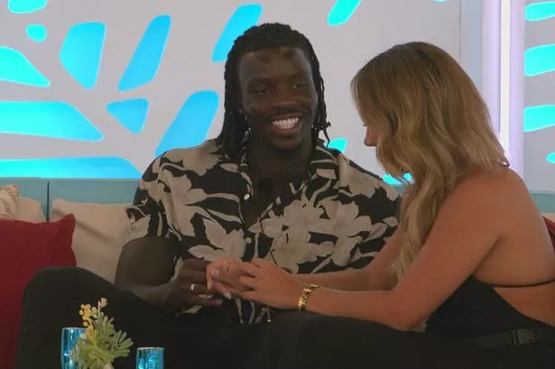 Dejon Noel-Williams and Meg Moore sat in the Love Island villa.