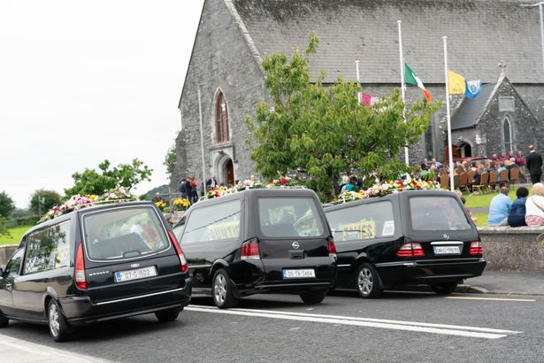 The three hearses at the funeral