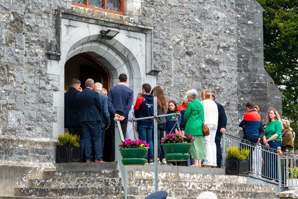 Mourners filling the Church of the Immaculate Conception