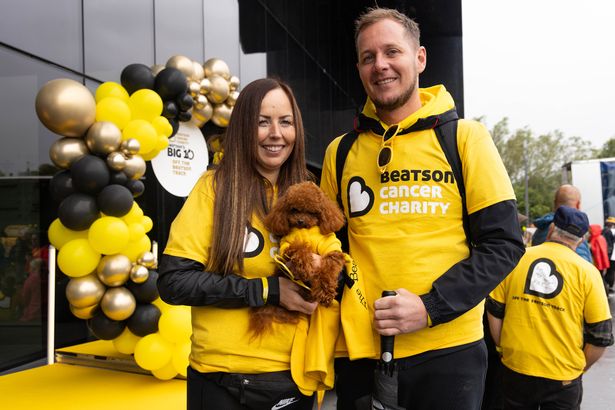 Natalie Forrest of Uddingston and brother John, with toy poodle Nico taking part in Off the Beatson track 10km walking fundraiser in 2024