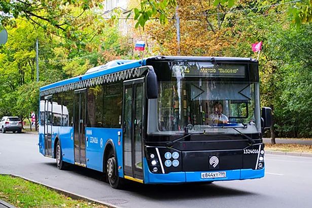 Blue bus on road in Russia