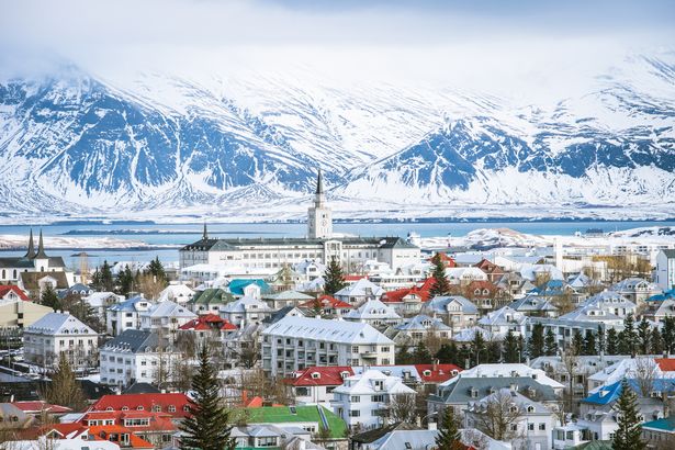 Scenic shot of the city of Reykjavik and the distant mountains during winter