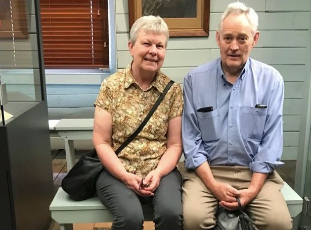 Heather Wilkinson (left) poses on a bench with her husband Ian