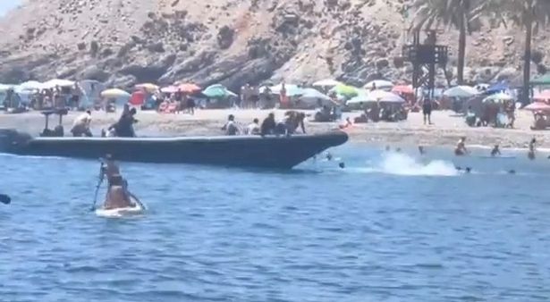 The men seen getting off the speedboat