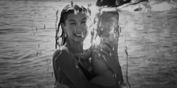 Hailey Bieber holding baby Jack Blues