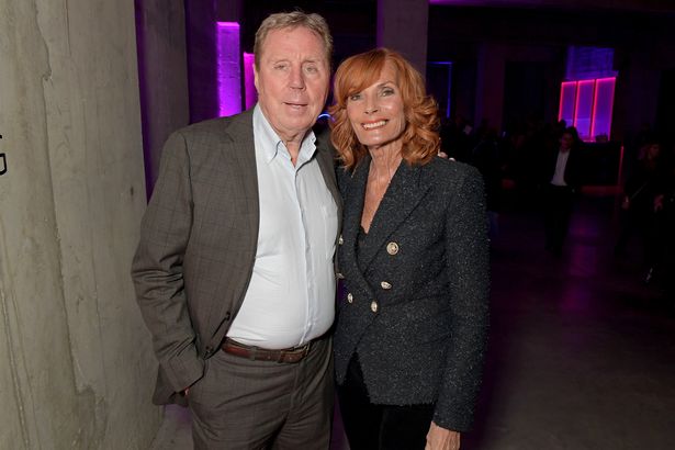 Harry Redknapp, in a brown suit, and his wife Sandra Redknapp, in a dark suit, at an event in 2020.