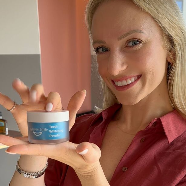 Woman holding Teeth Whitening Powder