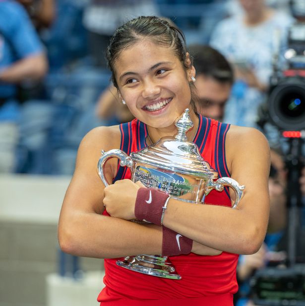Flushing, N.Y.: Tennis champion Emma Raducanu hugging her trophy in disbelief after defeating Leylah Fernandez in the women's finals and receiving $2.5 million at the UST,A Billie Jean King Tennis Center in Flushing Meadow Park, in Queens, New York on September 10