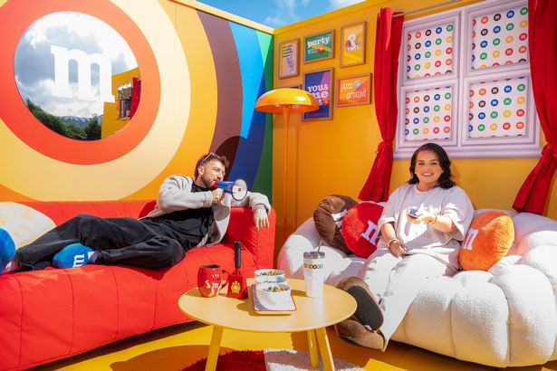 Sam Thompson and Scarlett Moffatt host M&M'S Couch Confessions pop up at Battersea Power Station, unveiling the weird and wonderful TV rituals of the nation.