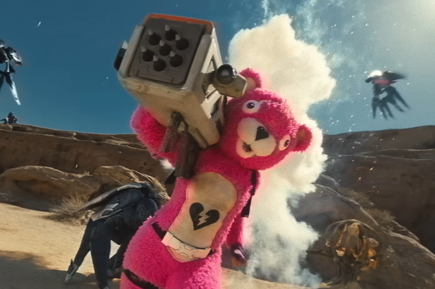 Cuddle Team Leader runs away from Tokusatsu-style bugs with a rocket launcher on her shoulder in Fortnite.